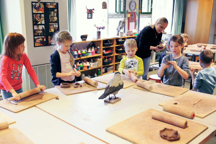 Children at a ceramics class.