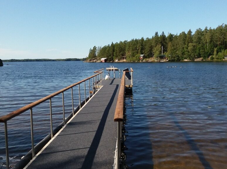 Beach in lappi with a pier.