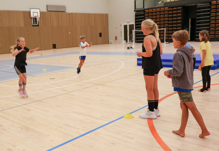 Children in the sports hall.
